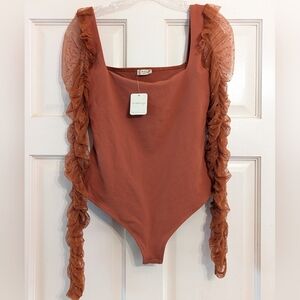 NWT Free People Must Be Love Bodysuit in Gold Rust
